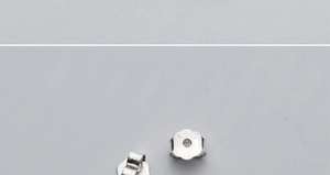 Macro view of S925 sterling silver earring backs with engraved hallmarks for jewelry making