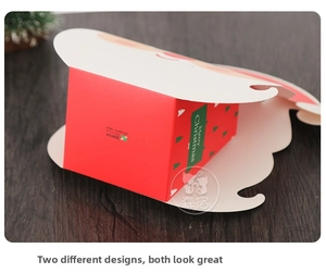 Detail of Santa Claus gift bag with Merry Christmas text and festive tree patterns