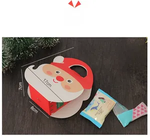 Detailed view of red Christmas gift box with Santa motif and 19cm dimension markings