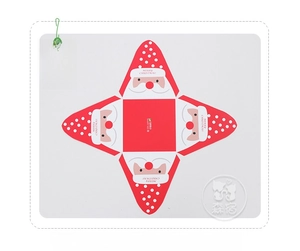 Flat lay of red Christmas pyramid gift box with Santa Claus print and folding design
