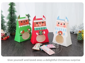 Detail view of cartoon Christmas gift boxes with round window and cute festive prints