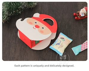 Festive Santa Claus paper gift bag for Christmas treats on a rustic wooden background