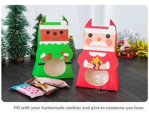 Detailed view of Christmas cartoon gift boxes with window for cookies and treats