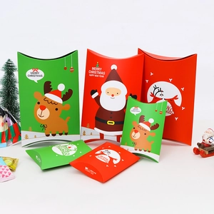 Foldable Christmas pillow boxes with Santa and reindeer patterns for holiday treats