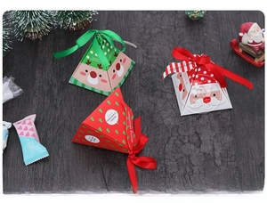 Three-dimensional Christmas pyramid gift boxes with ribbons and Santa deer illustrations