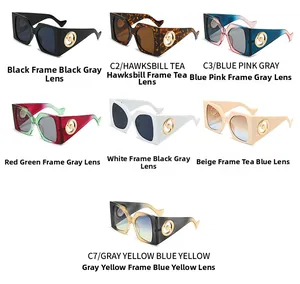Multiple oversized square sunglasses in varied colors with gold interlocking temple logos