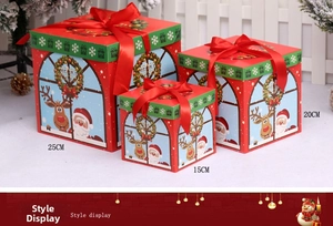 Three-piece red Christmas gift box set with festive cartoon patterns and silk ribbons