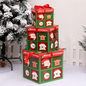 Three-piece Christmas gift box set in red and green with festive Santa and reindeer prints
