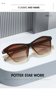 Detail of trendy gradient tortoise sunglasses with elegant gold metal hinge accents
