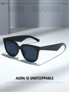 Close-up of olive green sunglasses with thick black frames and textured temples on white