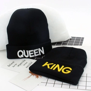 Black knitted beanies featuring white QUEEN and yellow KING embroidery for couples