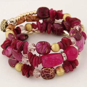 Bohemian multilayer wrap bracelet with red turquoise beads and vintage gold accents