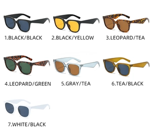 Flat lay of vintage square sunglasses in seven assorted frame and lens colors