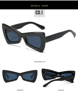 Detail view of black butterfly triangular sunglasses with PC frame and smoky lenses