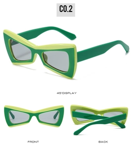 Detailed views of geometric butterfly sunglasses in two-tone green with grey lenses