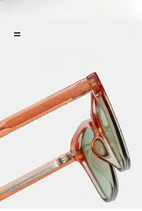 Macro view of tortoiseshell TR90 square sunglasses featuring durable metal core temples