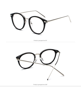 Detail view of round black frame glasses with slim silver metal temples and nose pads