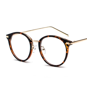 Retro round leopard print eyeglasses with gold metal temples on a clean white background