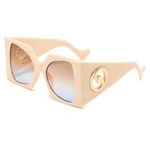 Chic oversized square sunglasses with wavy temples and gradient lenses in beige