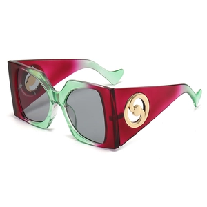 Square oversized sunglasses with gradient burgundy and mint green frames and gold details