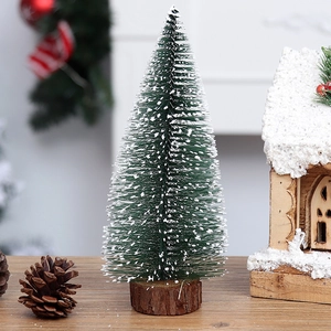 Miniature snow-flocked cedar Christmas tree with wooden base for desktop festive decoration