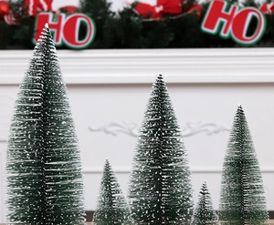 Set of five mini flocked cedar Christmas trees with white snow and round wood bases