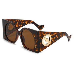 Oversize square tortoise shell sunglasses with brown lenses and gold temple detail