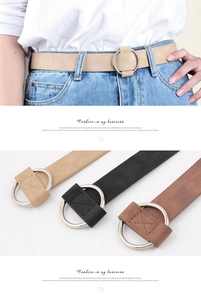 Detail showing women's fashion waist belt with a round metal buckle in three colors