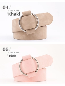 Detail of 3cm wide khaki and pink faux leather belts with silver round metal buckles