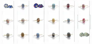 Macro display of diverse colorful crystal inlaid beads with large holes for DIY jewelry