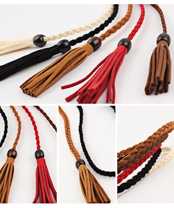 Detail of woven waist belts with wooden beads and suede tassels in various colors