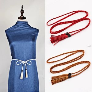 Braided tassel waist belts in white, red and brown shown on model and flat lay