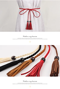 Detail of woven waist belts with wooden beads and tassels in red, black, and tan