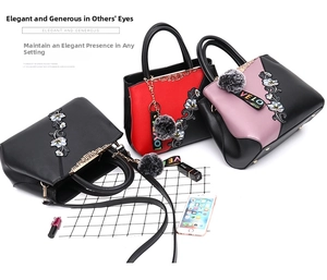 Detailed view of floral embroidery and metallic hardware on stylish PU leather handbags