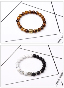 Detail of 8mm tiger eye and lava stone bracelets with gold and silver buddha charms