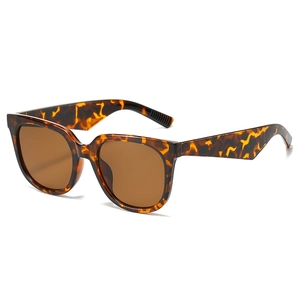 Classic tortoise shell sunglasses with dark brown lenses in a trendy oversized retro style