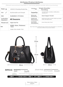 Detailed view of the embroidered flower pattern and smooth PU leather of the handbag