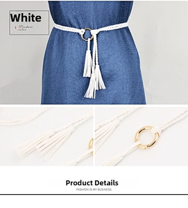 Detail of white woven rope belt featuring fringe tassels and a gold metal ring buckle