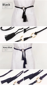 Detail of woven waist belt with tassels and gold buckle in black and navy blue