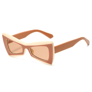 Fashionable two-tone cream and amber cat-eye sunglasses with thick geometric PC frames