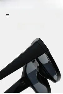 Detailed side view of high-gloss black sunglasses legs with lightweight elastic material