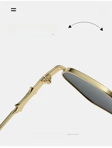 Close-up of golden metal hinge and textured temple detail on polygon sunglasses