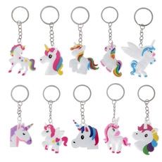 Set of ten colorful unicorn keychain pendants in various pastel shades and styles