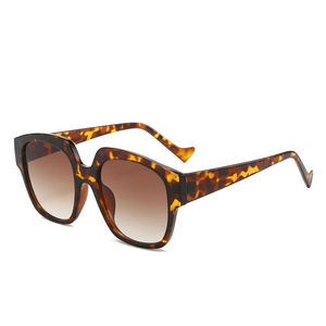 Retro oversized square sunglasses featuring leopard print frame and brown gradient lenses