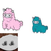 Close-up of pink and teal enamel alpaca pins with butterfly clasp backings
