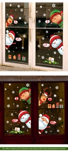 Détail de stickers de Noël avec Père Noël et bonhomme de neige sur surface vitrée