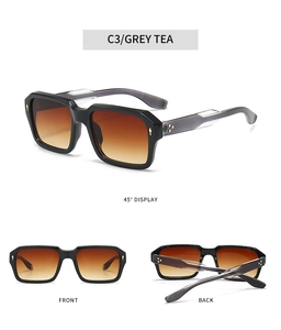 Detail view of square sunglasses with C3 grey tea gradient lenses and metallic trim