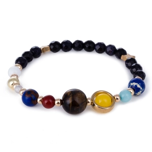 Detailed view of solar system bead bracelet with natural tiger eye and lapis lazuli stones