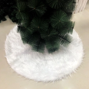 Plush white faux fur Christmas tree skirt with soft texture for holiday floor decoration