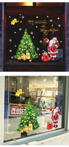 Christmas tree and Santa window stickers displayed on glass in day and night settings